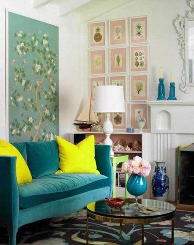 Contrasting aqua blue with bright strong yellow pillows and mint green wall panel and decors