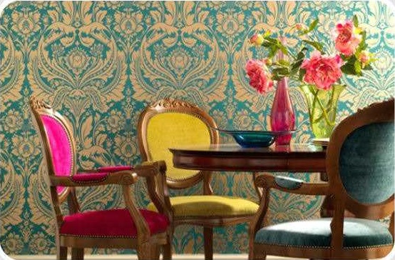 Period ornate blue textured wall paper with assorted yellow magenta and blue elizabethan chairs